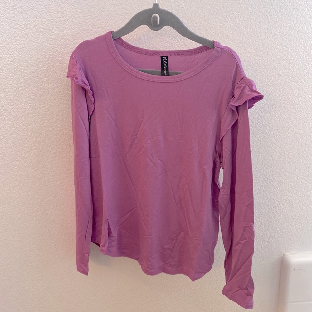 Girls long sleeved ruffle shoulder top